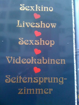 Seitensprung - Zimmer (Hinweistafel an einem Pornokino in Berlin)